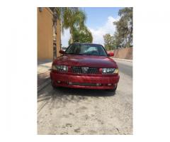 nissan tsuru 2011 rojo