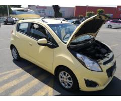 chevrolet spark 2013 amarillo