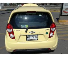 chevrolet spark 2013 amarillo