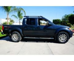 nissan frontier 2012 negro