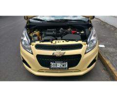 chevrolet spark 2014 amarillo