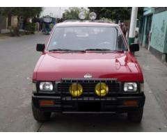 nissan doble cabina 2005 rojo